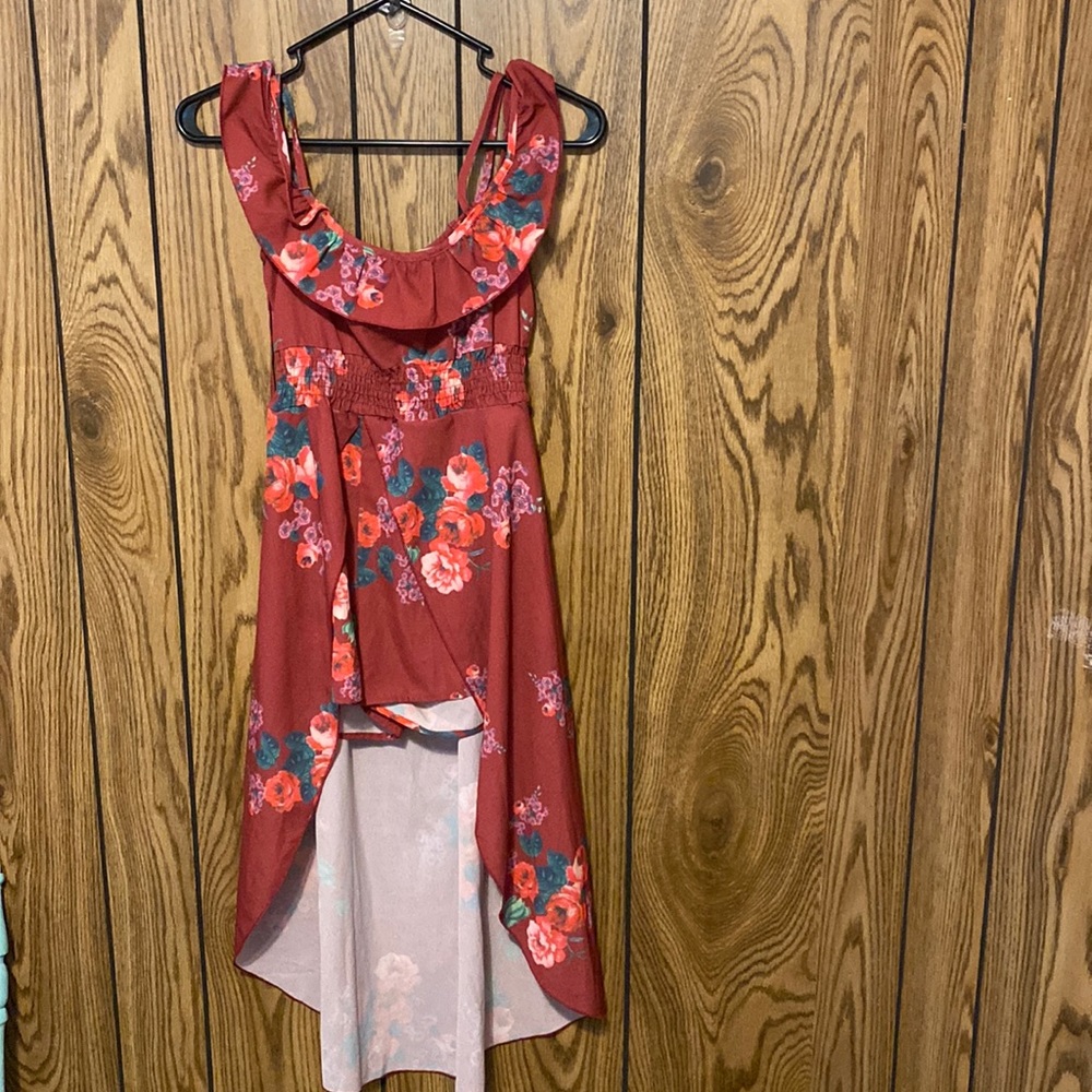 Dark purple, has straps to where with it, has shorts